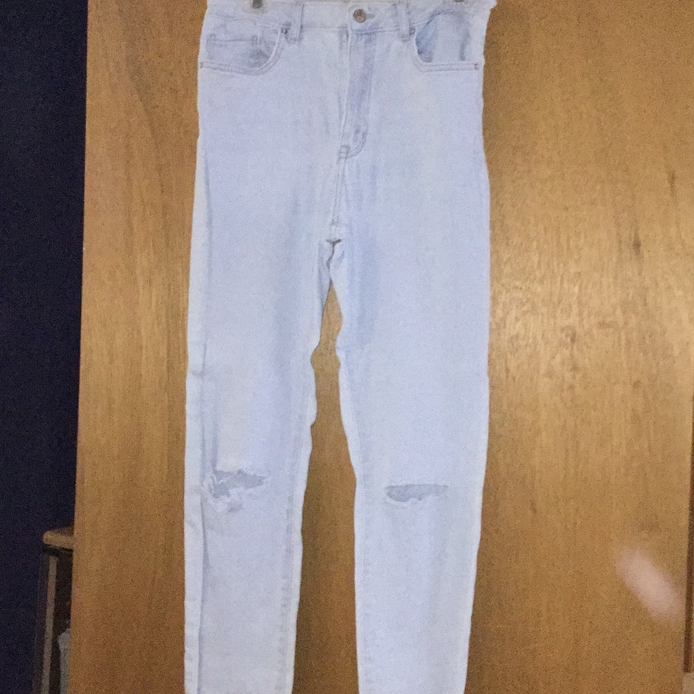 light blue ripped jeans